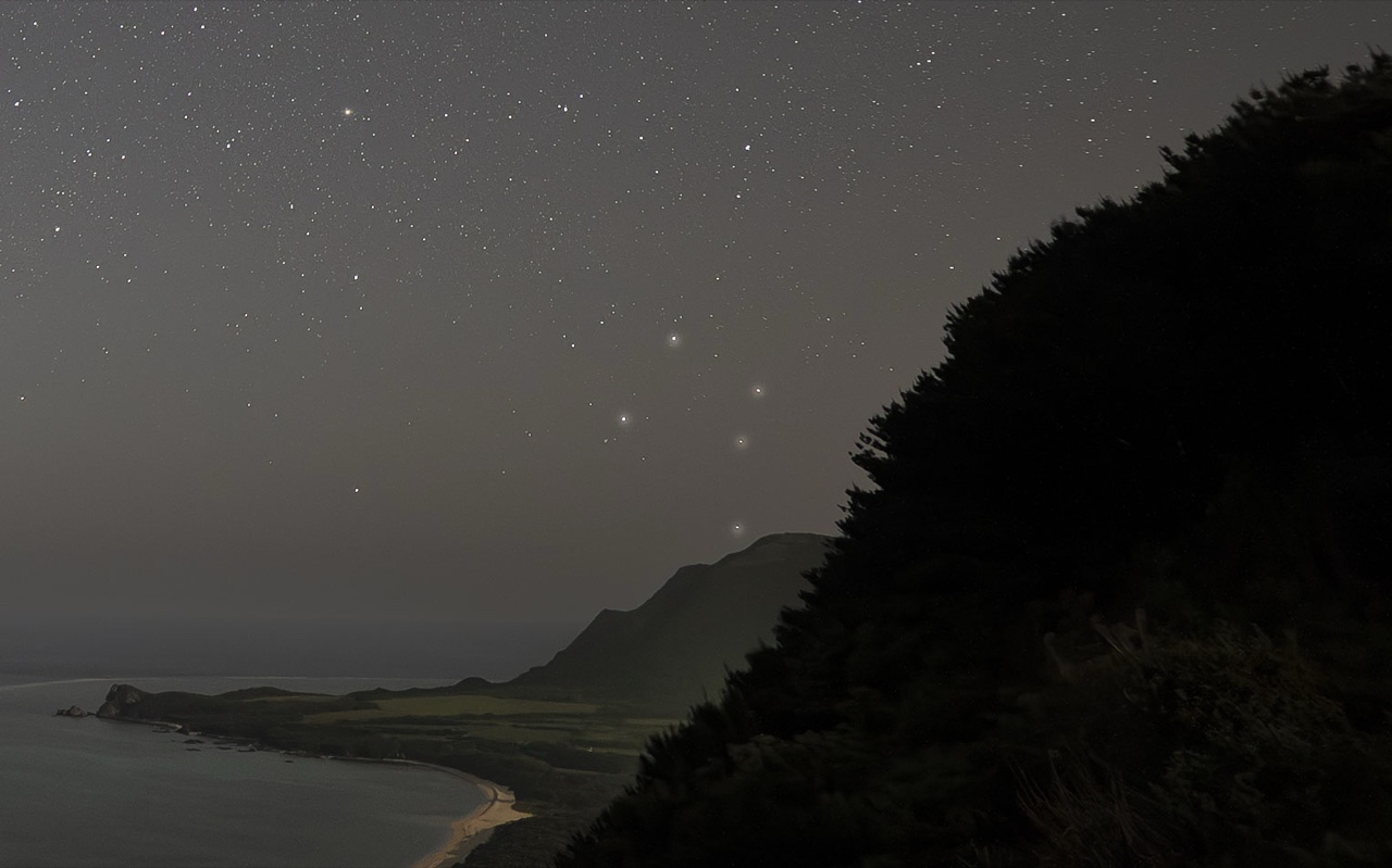 Coastline starry sky scenery at Nagareboshi no Oka stargazing spot, Ishigaki Island