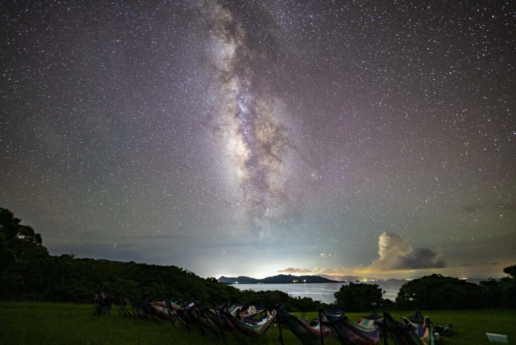 Hammock stargazing milky way portrait at Nagareboshi no Oka stargazing spot, Ishigaki Island